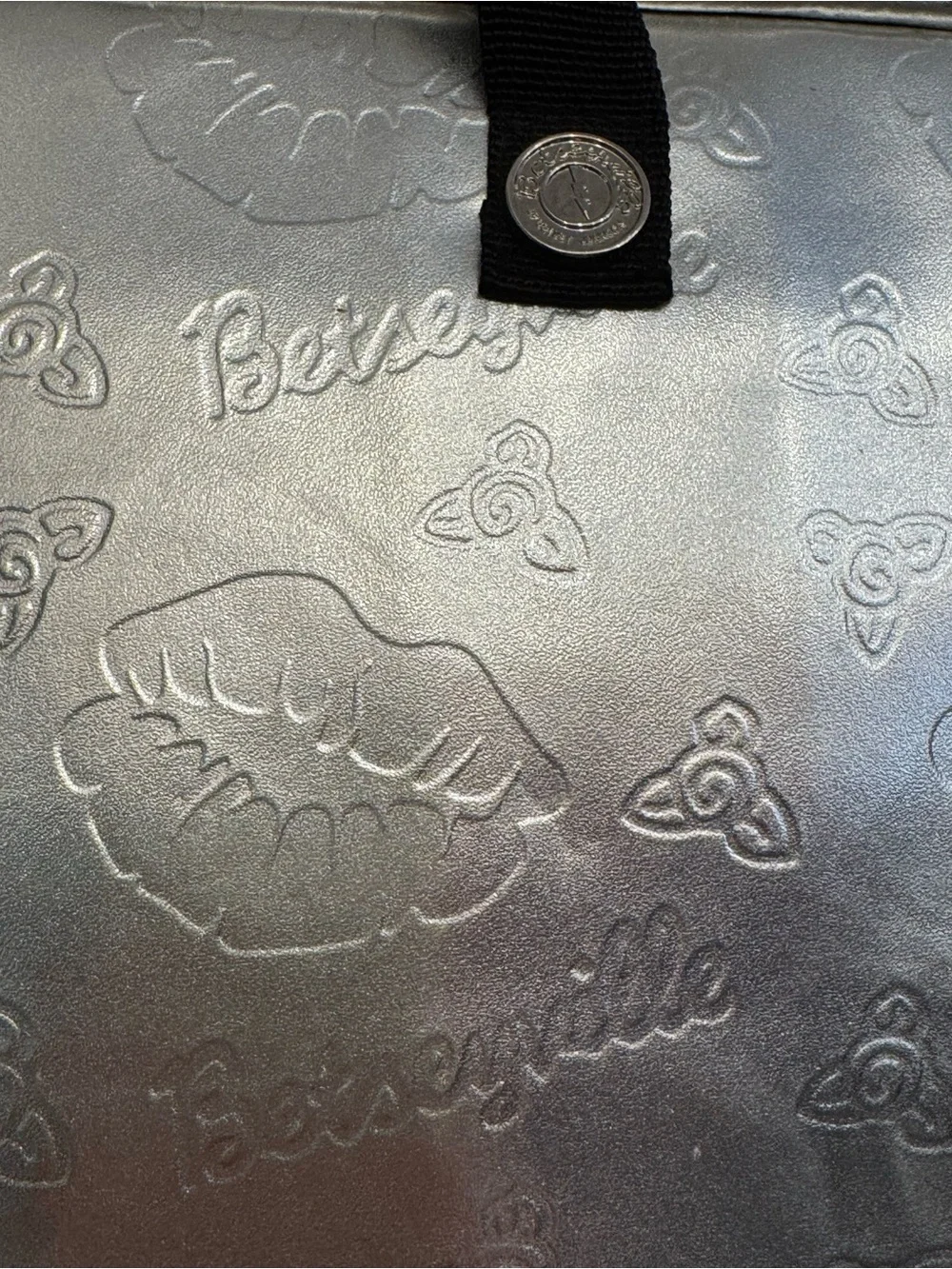 Betseyville Silver Metallic Laptop Bag Embossed Lip and Flaral Pattern